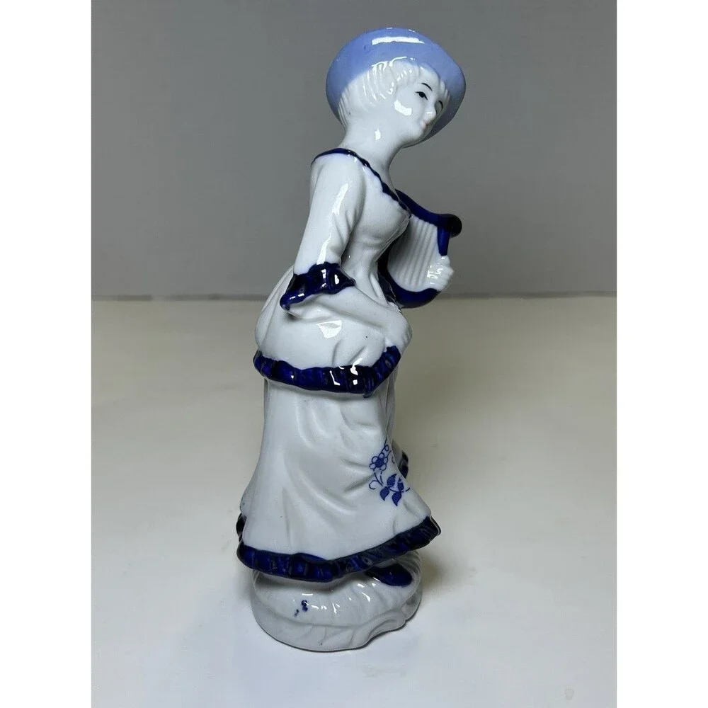 Vintage Victorian/Colonial Porcelain Women Playing Instrument Figurine